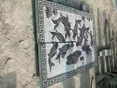  九魚圖地雕 